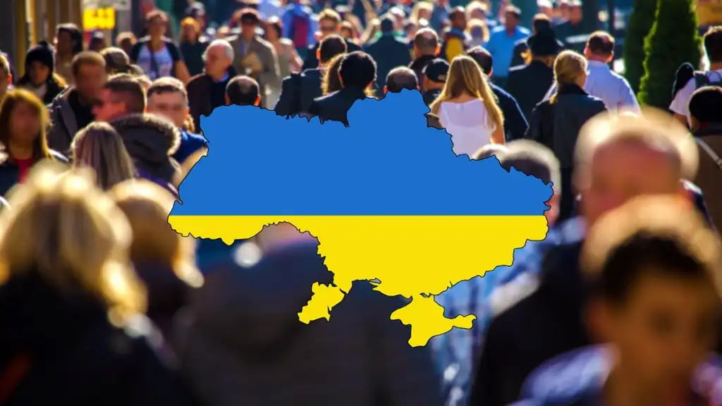 Карта України на фоні густонаселеного українського міста